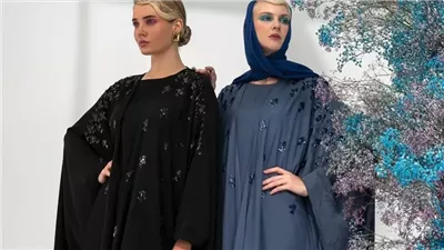 مصممات سعوديات يدمجن العباءة التقليدية بالموضة العصرية في شوارع الخبر