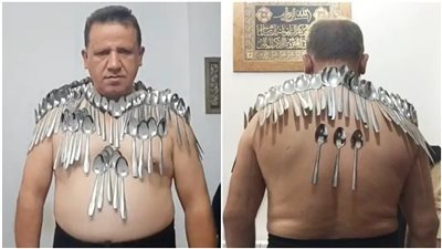 رجل إيراني مغناطيس بشري  يحطم رقمه القياسي في موسوعة غينيس لموازنة ما يقرب من 100 ملعقة على جسده 